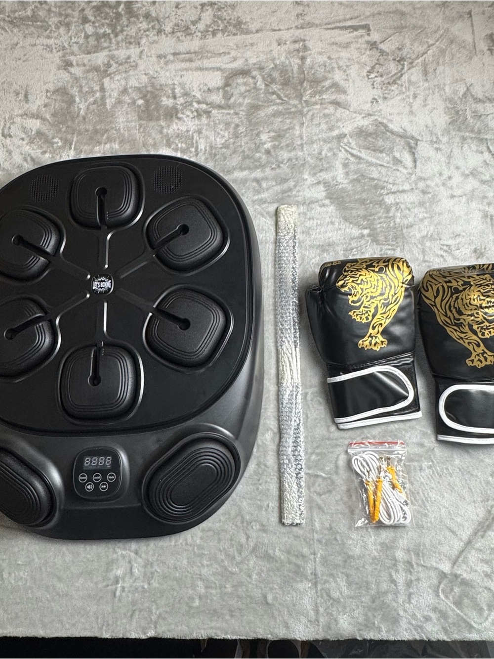 Black Vibration Plate Trainer with Black & Gold Boxing Gloves